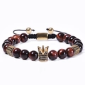 8mm red tiger eye beaded bracelet with a gold zircon crown and black braided rope - Adjustable Woven Style / Reddish Brown