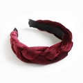 Braided velvet headband in deep wine red color featuring a stylish twisted weave structure - Burgundy