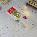 Detailed view of golden number 6 birthday candle in packaging with 5cm size marker - Number 6 / Gold
