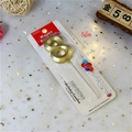 Detailed view of golden number 8 candle in blister pack showing 5cm height and metallic finish - Number 8 / Gold