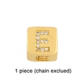 Close-up of a gold-plated dice charm with rhinestone letter E for DIY bracelets - Gold Letter E Pendant Bead