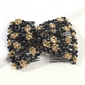 Detailed view of handmade black and gold beaded magic hair comb with a bow design - Black+Gold
