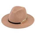 Close-up of beige wool jazz hat featuring black leather band and gold metal leaf pendant - Beige