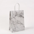 Detail of marble pattern paper bag with white rope handles on plain background - 15*11*6 / White Marble Style (211-4)