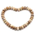 Macro view of natural Picture Jasper heishi beads for DIY jewelry making accessories - 4*6mm 1 Strand (Approx 90pcs) / Jasper