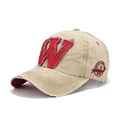 Detailed macro of vintage beige canvas baseball cap with red embroidered W patch - Adjustable / Khaki