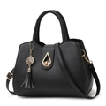 Classic black litchi textured tote bag with golden lock and stylish leather tassel - Black