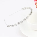 Silver metal headband with sparkling rhinestones displayed on a white coffee cup rim - Style 10-Silver