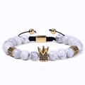 Natural white turquoise bead bracelet featuring a gold crown and adjustable cord - Natural White Howlite (Woven)