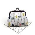 Close-up of cute alpaca print coin purse with secure vintage silver kiss-lock closure - Alpaca No. 6