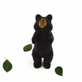 Standing black hand-carved wooden bear figurine with yellow nose on white background - Standing Black Bear / Black