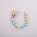 Baby pacifier clip with light blue silicone beads and natural wood beads for teething - Blue