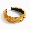 Braided velvet headband in ginger yellow color with a stylish twist design for women - Turmeric
