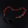 Black round sunglasses with leopard print acrylic chain strap on dark background - Red & Black Leopard (GB040)
