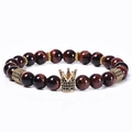 8mm natural red tiger eye beaded bracelet with a micro-inlaid zircon gold crown charm - Elastic String Style (Non-woven) / Reddish Brown