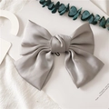 Elegant large grey satin bow hair clip with a silky finish on white background - Spring Clips / Gray