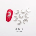 Macro view of moon-shaped silver nail charms with rhinestones, size 7x8.5mm - Silver White Rhinestone Crescent (LF3777)