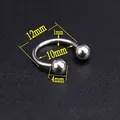 Macro view of 10mm stainless steel circular barbell ring for punk nail and body piercing - Circular Barbell/Ball/12mm