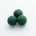 Three dark green wool felt Christmas balls with gold snowflake embroidery and hanging ropes - Snowflake Embroidery Style (No. 6)
