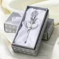 Detail view of a crystal rose gift with silver stem inside an elegant white satin-lined box - Silver Stem White Rose