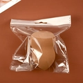 Brown teardrop-shaped makeup sponge blender in transparent resealable packaging - Gourd Shape (Individual Bag) / Milk Tea