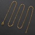 Detail of 18k gold plated stainless steel O-chain with lobster clasp on black background - Gold 2.0mm*45cm