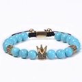 Verstellbares Armband aus Türkisperlen mit einer goldfarbenen Krone und schwarzen Zirkonia - Natürlicher Kaiserstein (Geflochten/Verstellbar)