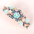 Detailed close-up of a floral hair clip with mint resin flowers and blue rhinestones - 8cm Spring Clip / Blue