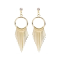 Close-up of gold geometric fringe earrings with crystal studs and metal tassels - Gold