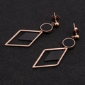 Pendientes geométricos de oro rosa con incrustaciones negras y cierres de mariposa - Rombo Hueco Estilo Geométrico