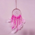 Pink heart dream catcher with soft feathers and beads against a matching pink background - Light Pink without Lights