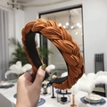 Braided fabric headband in caramel orange color for women with stylish twisted texture - Orange
