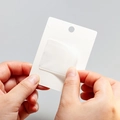Square translucent adhesive patch for shoe repair on white display card packaging - Necklace Card Back Strap