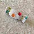 Plush squeaky candy-shaped dog toy with colorful polka dots and soft white faux fur - Colorful Polka Dot Candy