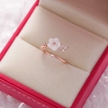 Detailed macro view of rose gold floral ring with zircon butterfly in a velvet gift box - 8#14119 (Rose Gold Shell Butterfly Flower)
