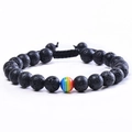 Bracelet en pierre de lave noire avec perle arc-en-ciel et cordon tressé réglable - Pierre de Lave Tissée