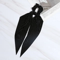 Elegant black corduroy bow scrunchie with long ribbons and premium striped texture - Black