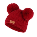 Close-up of red cable knit kids beanie with double faux fur pom-poms and leather patch - Burgundy Hat (Red Pom Pom)