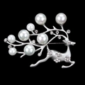 Silver deer brooch with white pearls and sparkling rhinestones on black background - Silver Running Deer