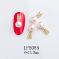 Macro view of pink pearl and rhinestone rabbit charms for DIY nail art decoration - 5055 Light Pink Pearl Exquisite Rabbit Style