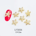 Star-shaped gold alloy nail charm with pink rhinestone and pearl detail, 12x12mm size - Gold Starfish Pearl Style (5056)