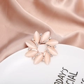 Elegant rose gold flower brooch with pink stones and crystals on satin background - Pink Radial Ring