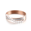 Elegant rose gold titanium bracelet with white pearls and sparkling pavé crystal detail - Rose Gold
