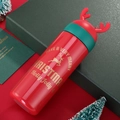 Red Christmas thermal mug with green elk antlers and golden holiday greetings - 330ML / Red