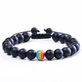 Bracelet ajustable en pierre de lave mate avec une perle centrale aux couleurs de l'arc-en-ciel - Pierre Dépolie Tissée