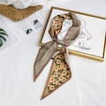 Brown floral and houndstooth double-sided silk scarf tied as a stylish handbag accessory - Yellow Floral Check