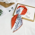 Silk scarf with orange and light blue tones featuring a brown pony pattern design - Orange Blue Horse Block