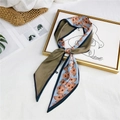 Blue and khaki floral silk scarf tied in a bow with houndstooth pattern details - Blue Green Floral Check