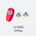 Detail of 8x8mm gold alloy 3D floral nail art charm with blue marquise rhinestones - 5086 Royal Blue
