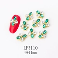 Detail of 9x11mm green crystal butterfly nail charms with gold metallic base - 5110 Peacock Green + White